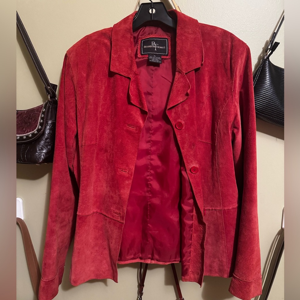 100% orange-reddish leather jacket
